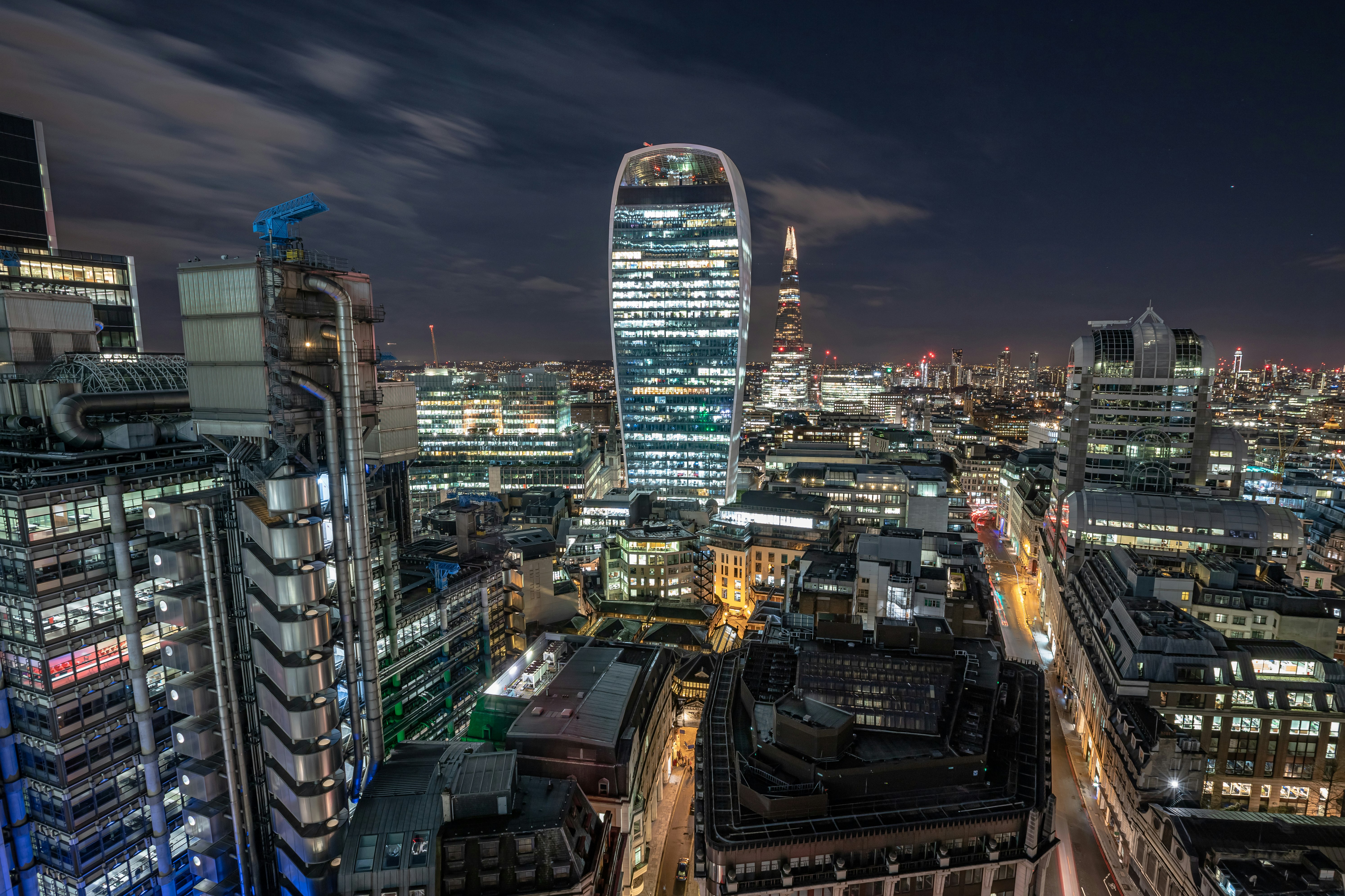 city with high rise buildings during night time